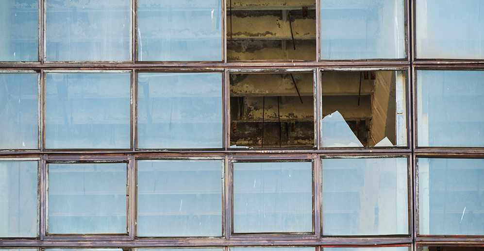 abandoned building in central virginia with broken glass